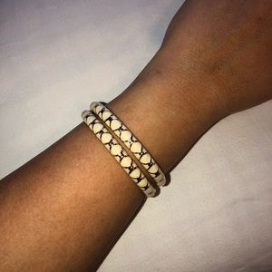 Never worn gold and cream bangles